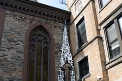 10-2 The Mandorla of Felix Varela Sculpture Is An Almond-shaped Piece Made of Aluminum Featuring The Lords Prayer At Church of the Transfiguration At 25 Mott St In Chinatown New York City.jpg
